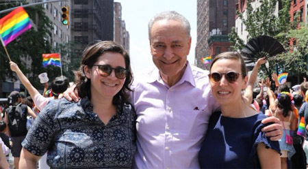 A picture of Chuck and his wife Iris and daughter Alison.